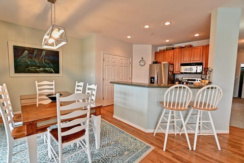 Living Room view into Kitchen and Dinning Room