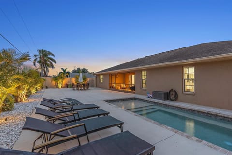 Welcome to Sunshine Manor! This beautiful home with an incredible outdoor pool area is going to blow your vacation expectations out of the water!