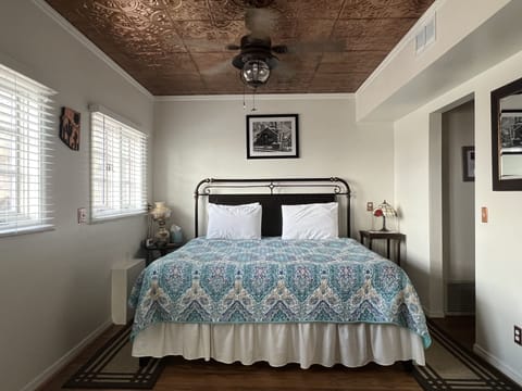 King sized bed with curtain separator for privacy.