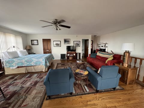 View of studio apartment from door leading to the deck