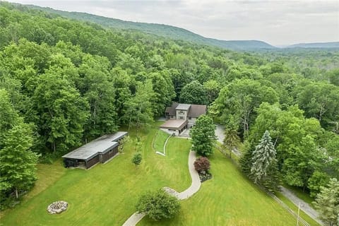 The Youngs Estate offers a peaceful escape with 12 acres and a relaxing firepit.