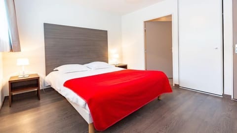 Relax on the comfy bed after a day outside.