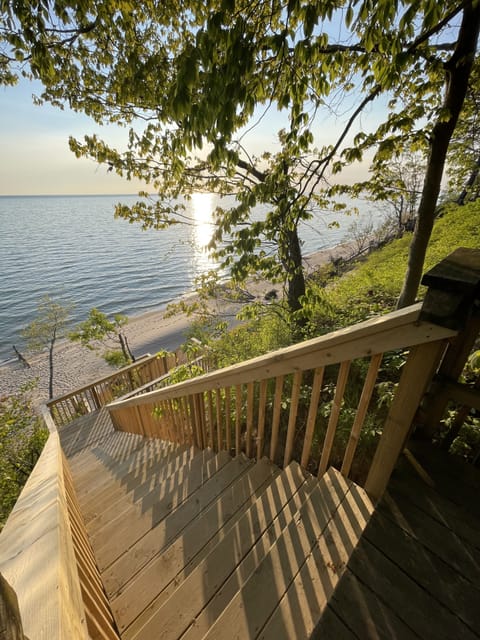 Approximately 10 minute walk to a secluded lake Michigan beach area.