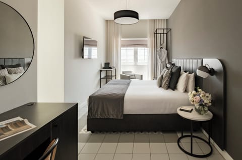 Junior Suite, Sea View | Premium bedding, minibar, in-room safe, individually decorated