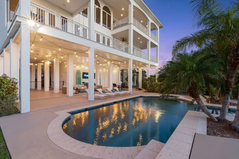 Cool off in the swimming pool and soak up the sun on the comfy sun lounges.