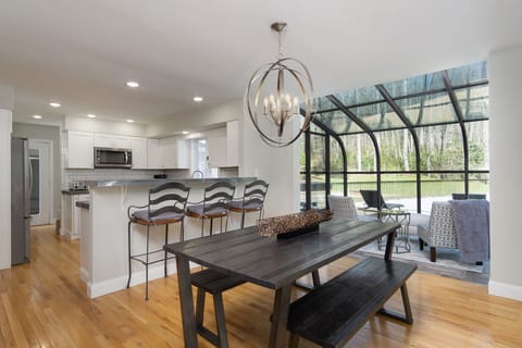 There's plenty of seating for family gatherings in the kitchen, dining area and sun room! The open concept makes group meals easy and fun.
