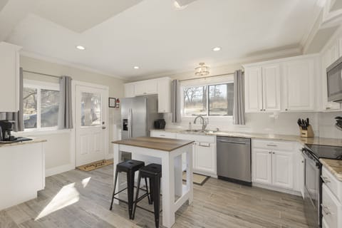 The spacious kitchen is on the lower level.