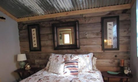 Master bedroom with queen size bed.