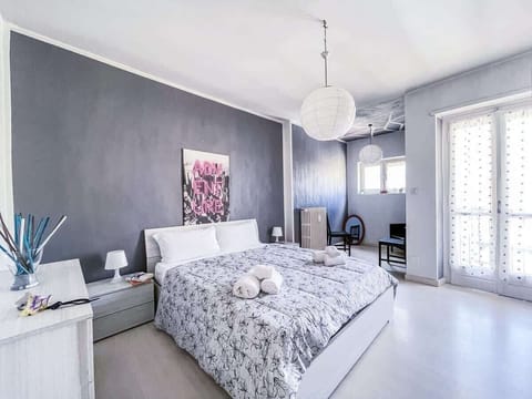 Double room with large wardrobe, flat screen TV and small balcony