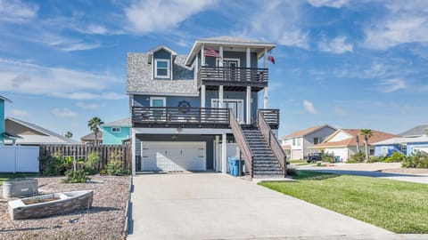 Coastal vacation home with nautical charm featuring multiple decks and ocean-breeze location in friendly neighborhood setting.
