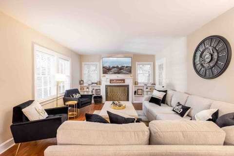 Spacious living rooms with enough seating for large groups and a 65” smart TV with complimentary Netflix 