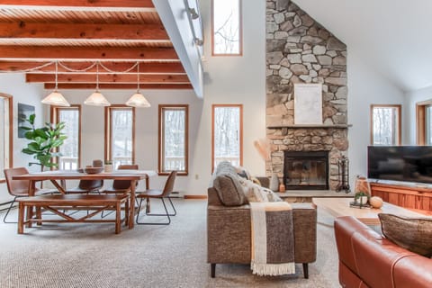 Open first floor living space includes living room, dining room and kitchen