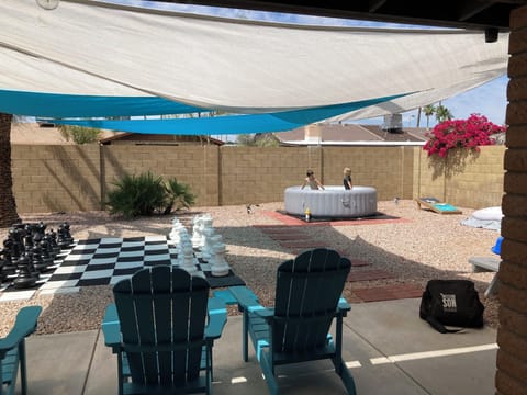 Relax and watch the kids swim, play games, or dig in the sand box. 