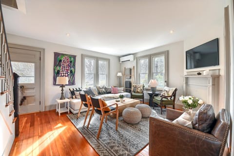 1910 farmhouse with 9 foot ceilings. Very warm living room with frame TV