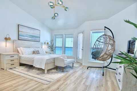 Dreamy master bedroom with unobstructed views of the Gulf