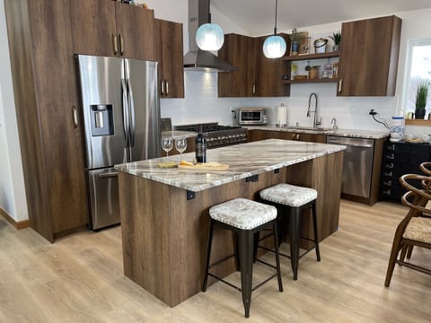 Kitchen with Island perfect for entertaining or eating. 