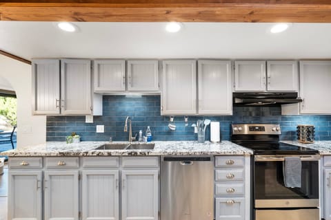 Large kitchen with plenty of counter space to prepare meals for the whole group!