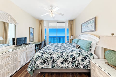 Primary suite with king bed and beach views
