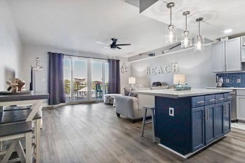 Lakefront Living Area with Flat Screen TV, Sleeper Sofa and Private Balcony Access