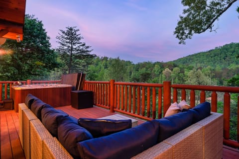 Watch the sun set over the ridge on the deck