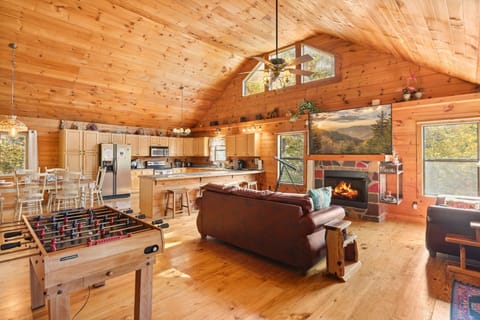 Grand, spacious living room flooded with natural light.