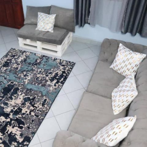 Apartment, 2 Bedrooms | Living area | 42-inch TV with digital channels