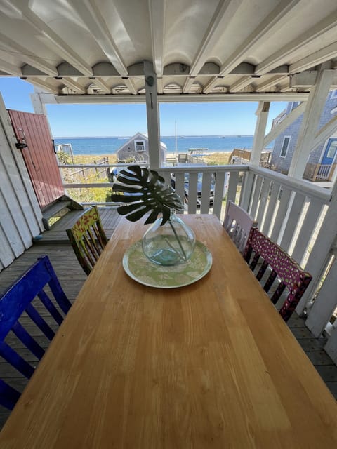 Covered porch with direct water views.  