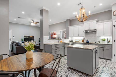 Our open-concept living area features high-end designer appliances & amenities.