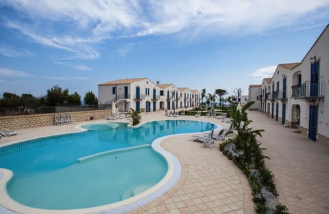 Seasonal outdoor pool, cabanas (surcharge), pool umbrellas