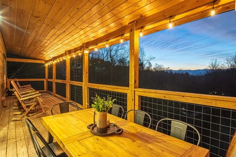 Imagine sitting right here with your drink. Trees sway and leaves rustle in the wind offering a unique dining experience while you wind down from a fantastic day.