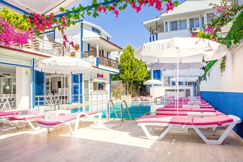 Outdoor pool, open 9:30 AM to 8:00 PM, pool umbrellas, sun loungers