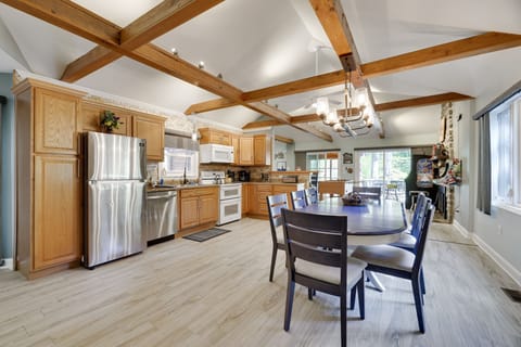easy flow from one space to another, under beautiful beamed vaulted ceilings 