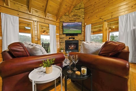 Get cozy in your Smoky Mountain cabin, have some wine and create beautiful memories.