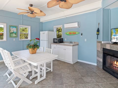 The Pool House boasts additional Bedrooms, a Kitchen, and a Wet Bar!
