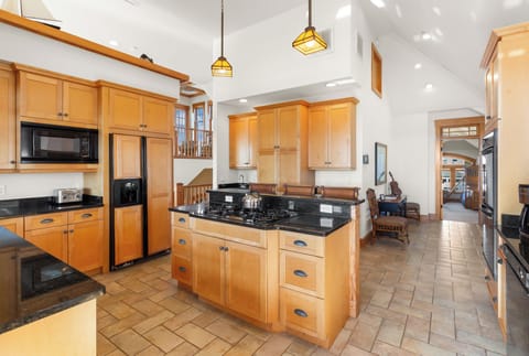 Whip up a delicious meal of fresh, local seafood in the gorgeous Kitchen with granite countertop, dual ovens, 2 dishwashers, and a Breakfast Bar with seating for 3.
