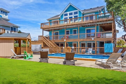 Boasting an impressive 7 Bedrooms and 7.5 Bathrooms, and featuring an elite locale in the contemporary community of Sea Pines in Duck!