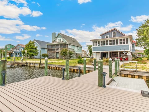This 5-bedroom home is located in Colington Harbour on 80' feet of scenic canal frontage with open access to the Albemarle Sound.