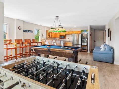 Have some fun in the expansive recreation room with a pool table, foosball table, giant Connect Four & Tic-Tac-Toe boards, 2 mounted TVs, and DVD/stereo.