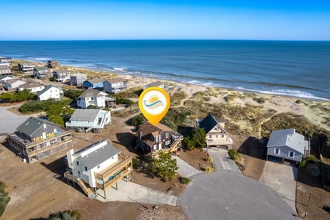 Find your oasis in this gem of a semi-oceanfront cottage located in South Nags Head.