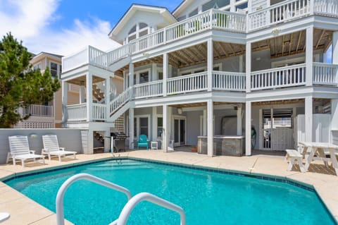 Back exterior with private pool