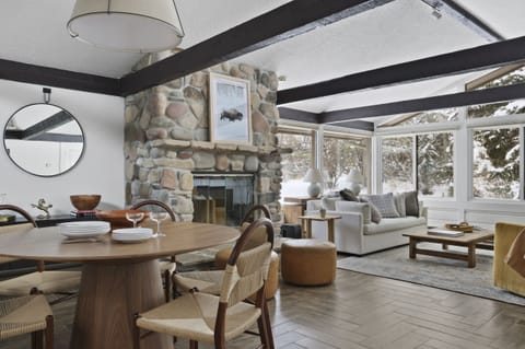 Living and Dining Areas with Fireplace