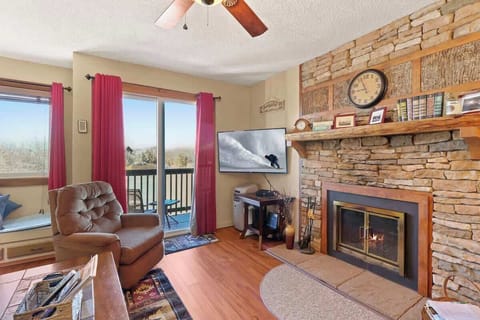 Step into comfort and warmth—our space feels like home with a comfy couch, coffee table, cozy fireplace, and a TV for enjoyable movie nights.