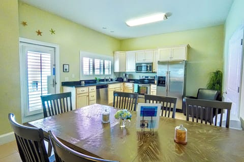 Fully equipped kitchen and dining area on the first floor