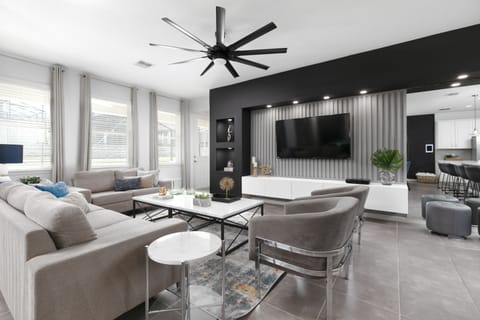 Enjoy some family time in our large living room with ample seating. 