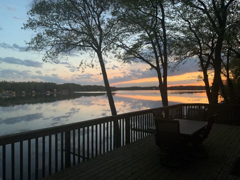 Wake up to golden sunrises and sparkling lake views from your deck-pure Michigan