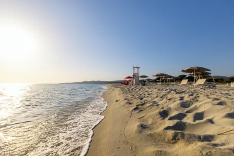 Private beach nearby, white sand, sun loungers, beach umbrellas