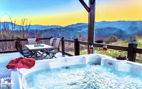 Hot Tub Retreat: Soak it up with stunning mountain views and evening sips on your private deck!