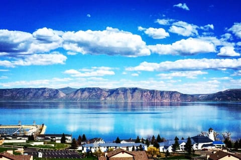 Crystal-clear lake views under bright blue skies