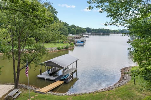 Enjoy the covered dock and lake views from Carolina Sunrise! Hammock on the dock for guests to enjoy.