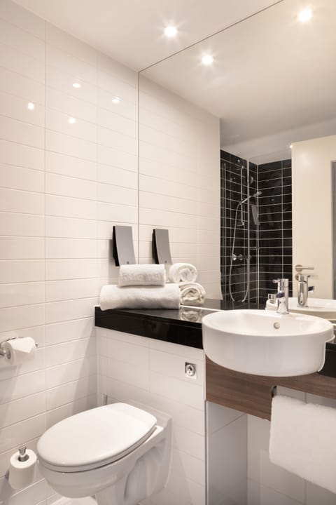 Shower, eco-friendly toiletries, hair dryer, towels